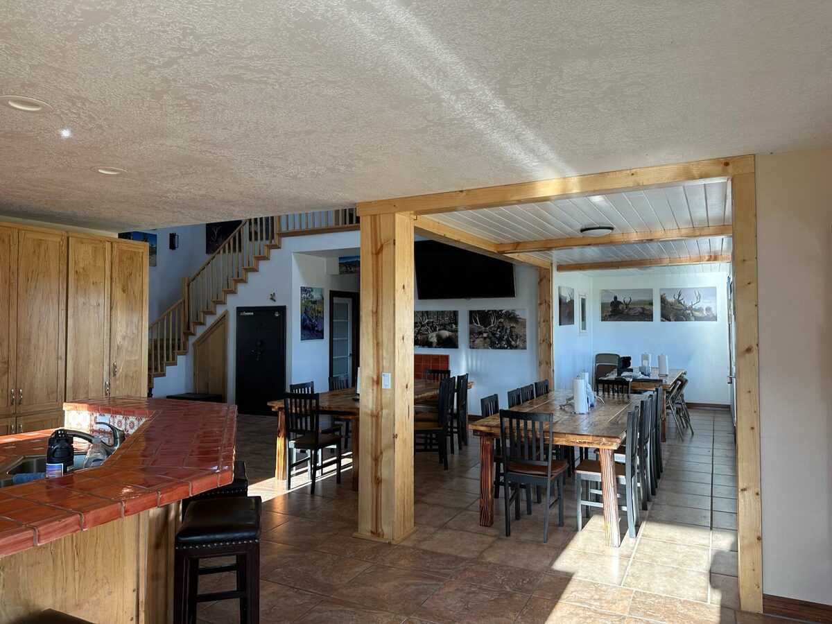 LOH lodge interior, open kitchen and dining in Magdalena, New Mexico